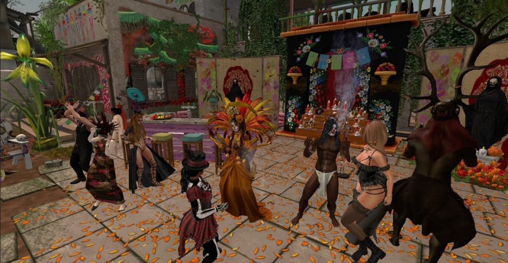 Dancers and villagers celebrate near a decorated altar in the jungle camp