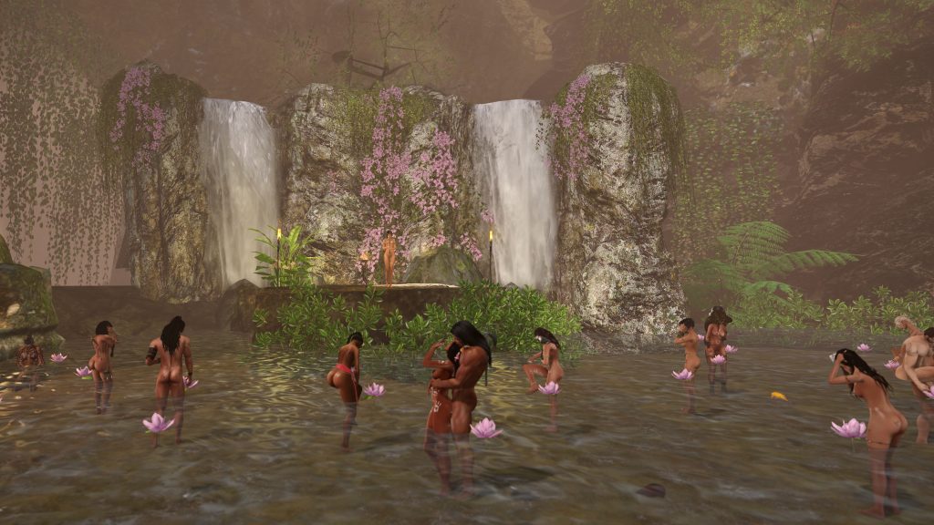 Unclothed tribespeople gather around a waterfall surrounded by lush jungle flora