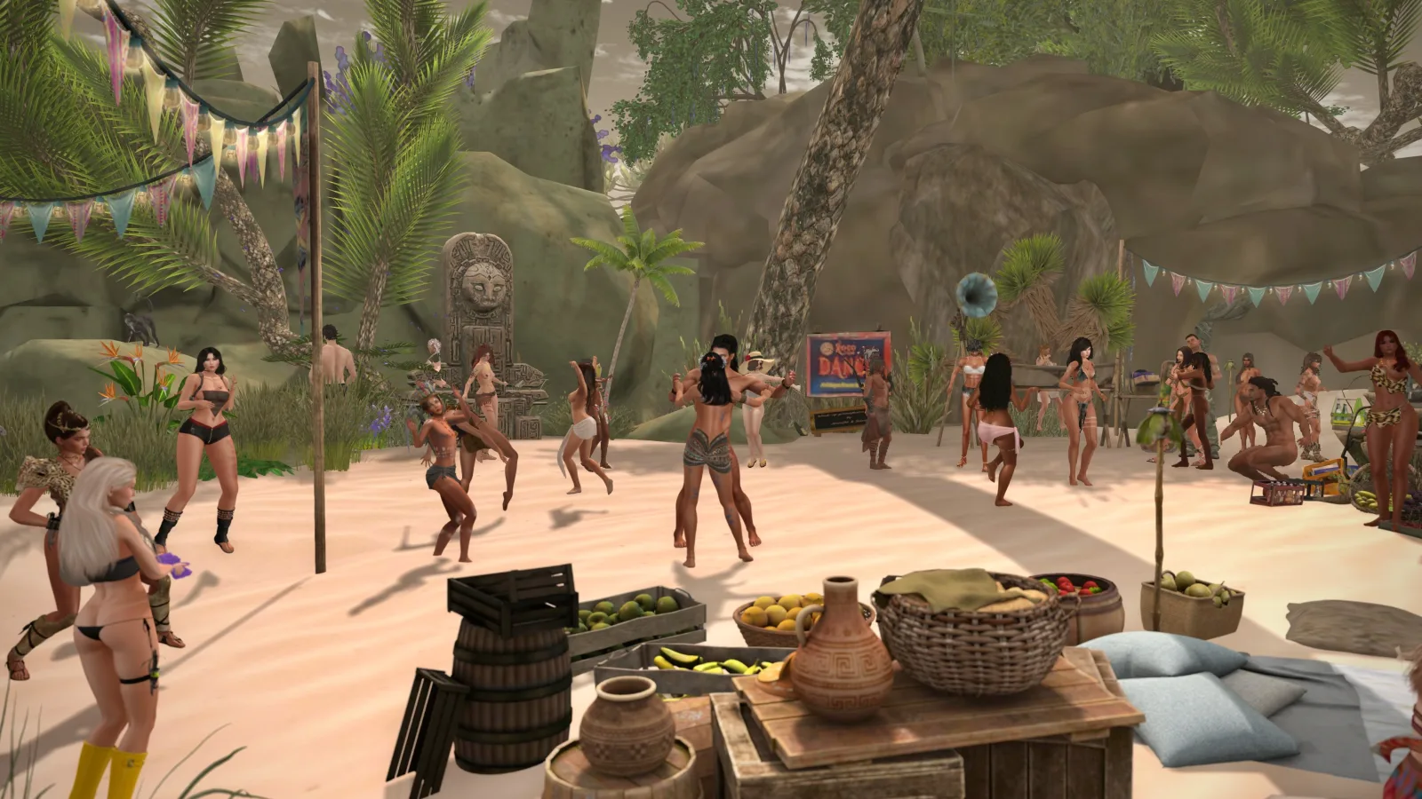 Men and women, many bare or topless, dance energetically on a sunlit beach surrounded by palm trees, stone carvings, and colorful decorations