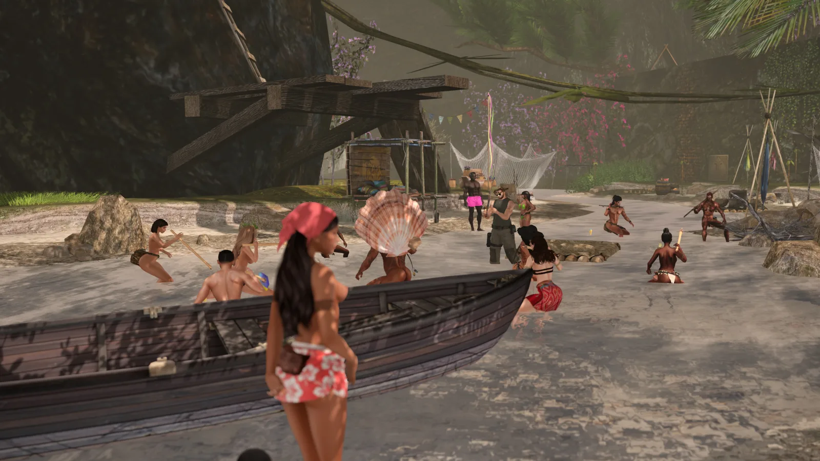 Group of people enjoying a tropical beach setting with boats and vibrant foliage.