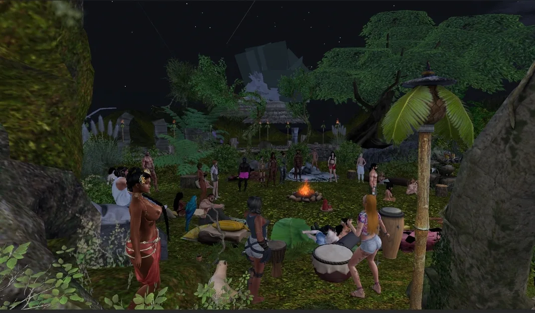 Tribal members gather around a campfire drumming in the jungle clearing at night