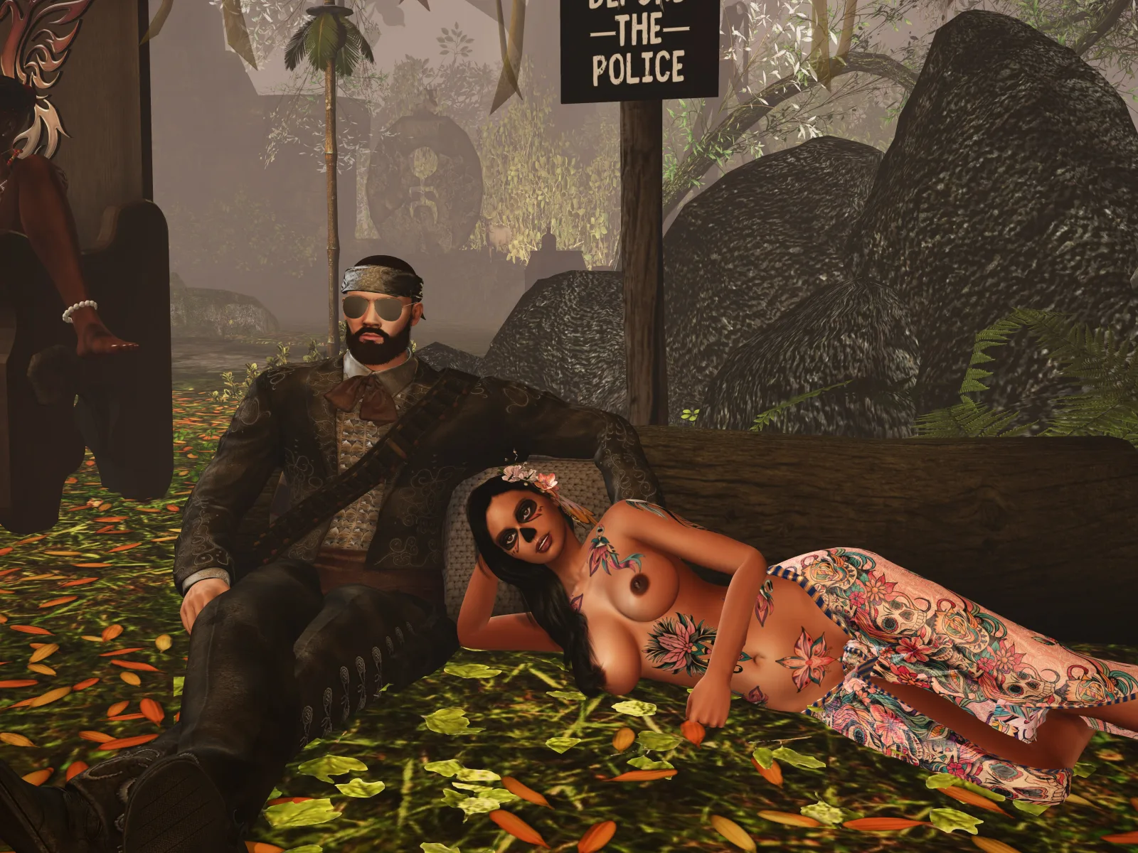 Topless native woman reclines beside a villager on leaf-strewn ground in the jungle camp