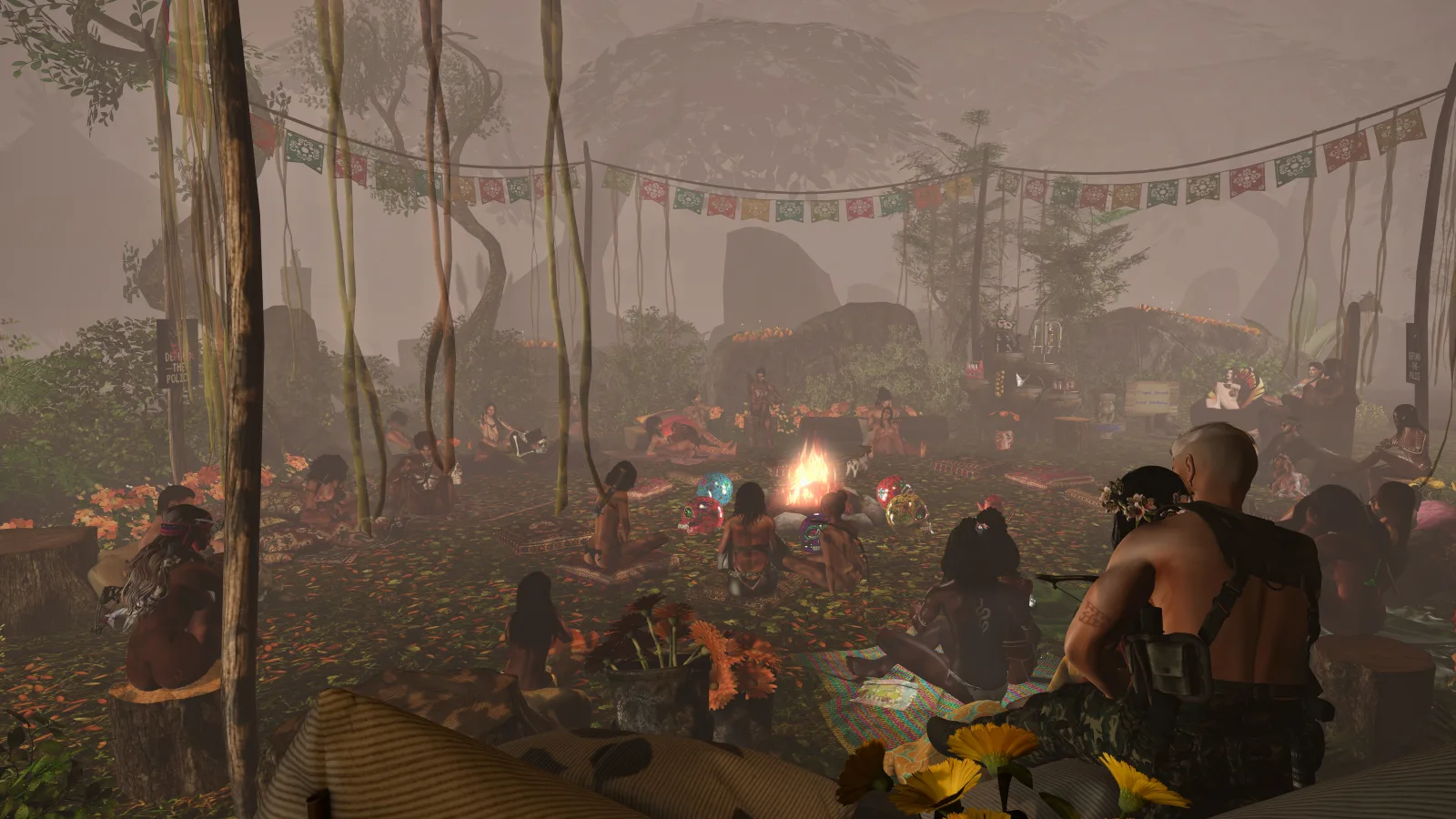 Villagers gather around a fire as a storyteller speaks in the jungle clearing