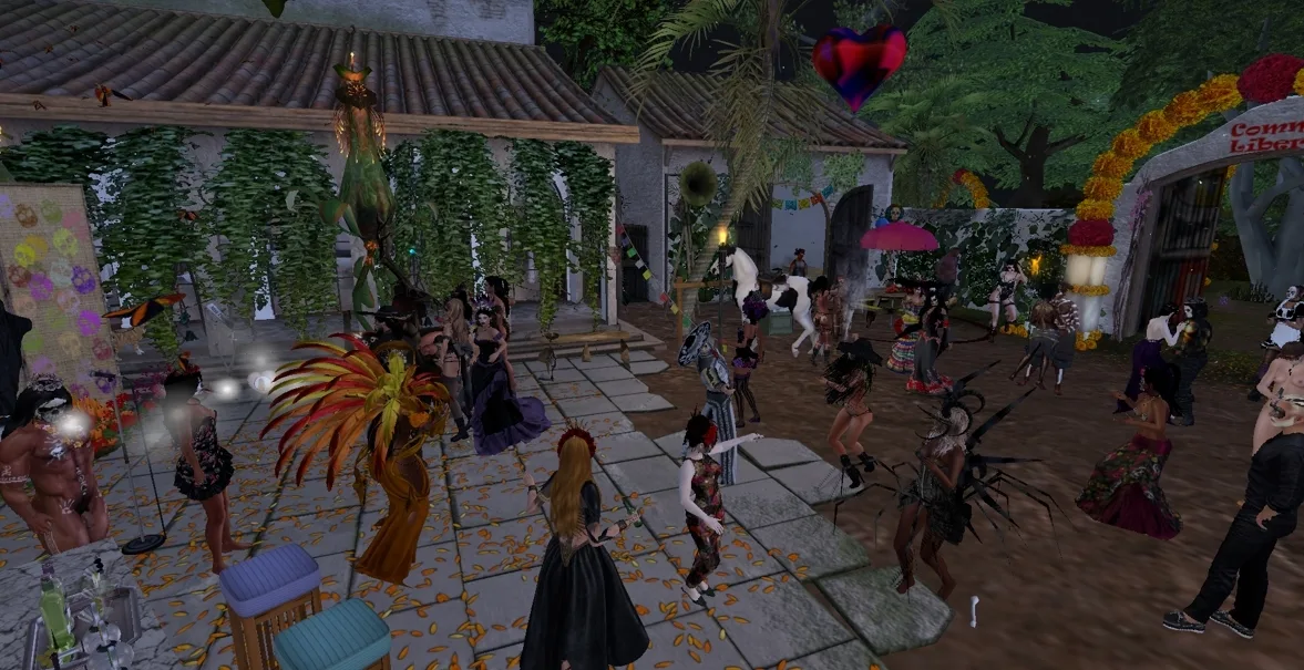 Dancers in colorful attire celebrate in a lively jungle camp gathering at dusk