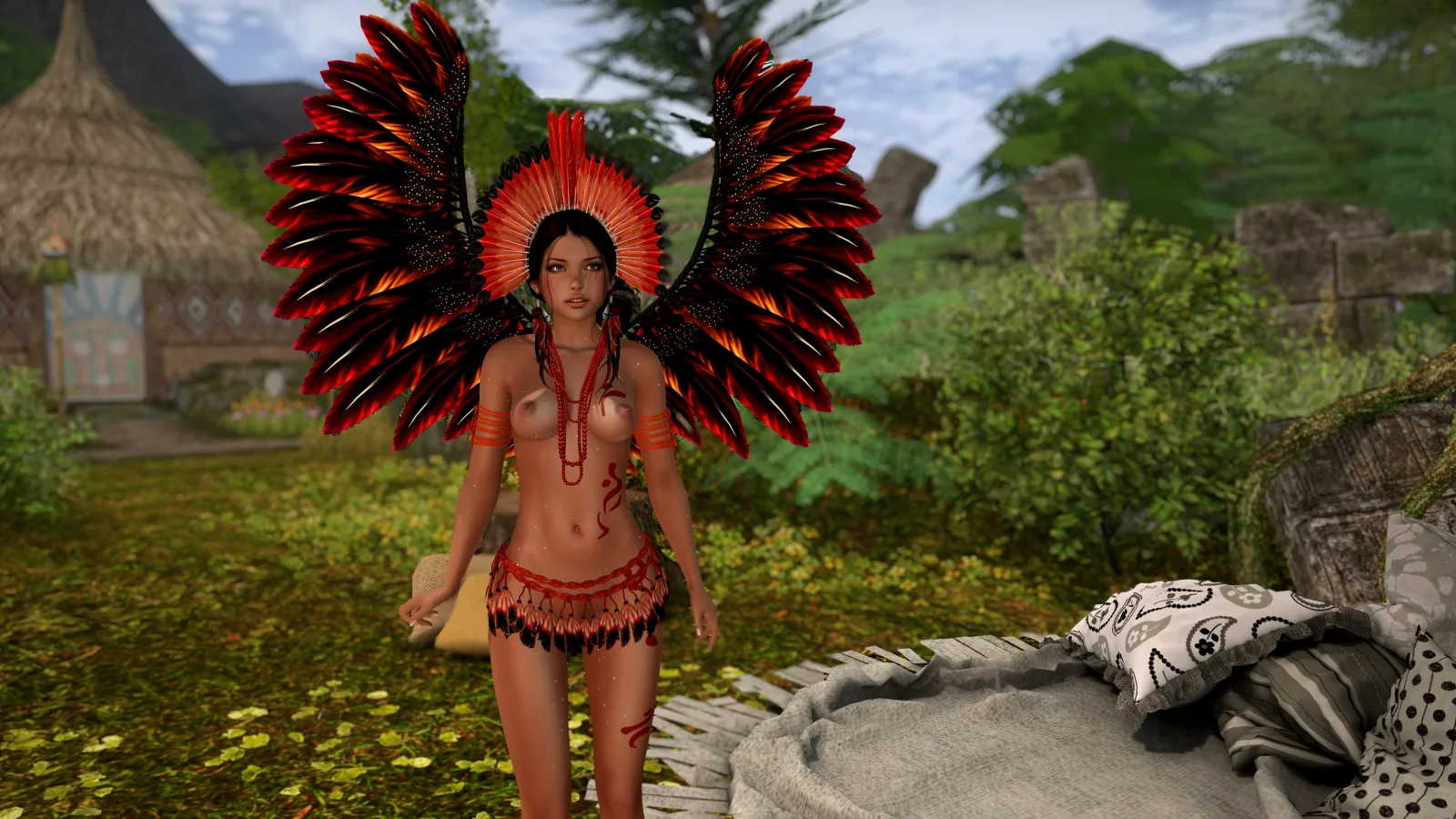 Native woman topless wears a red feathered headdress and wings while standing in the jungle camp