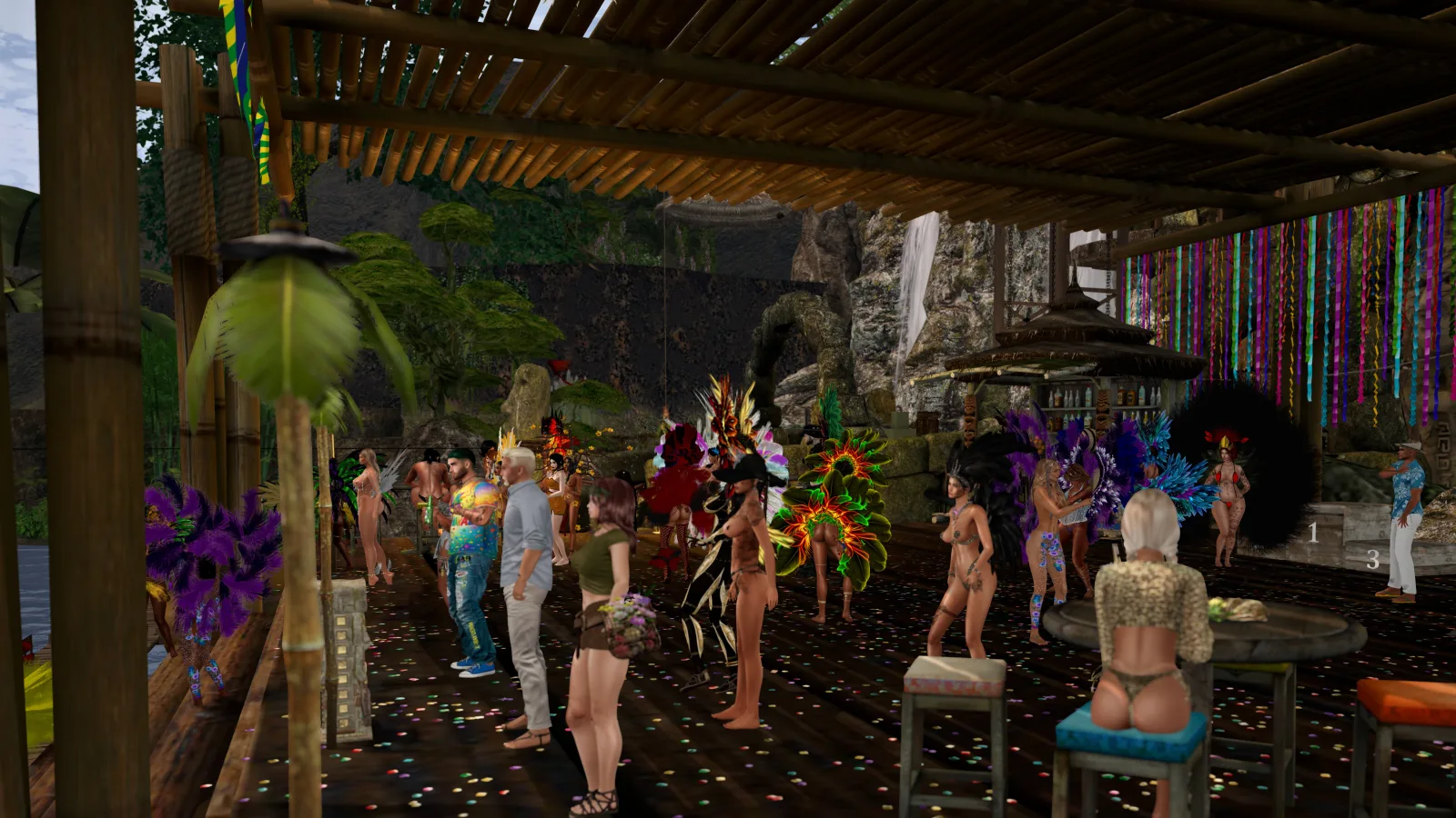 Dancers in feathered costumes dance under a bamboo canopy at the jungle camp by the waterfall