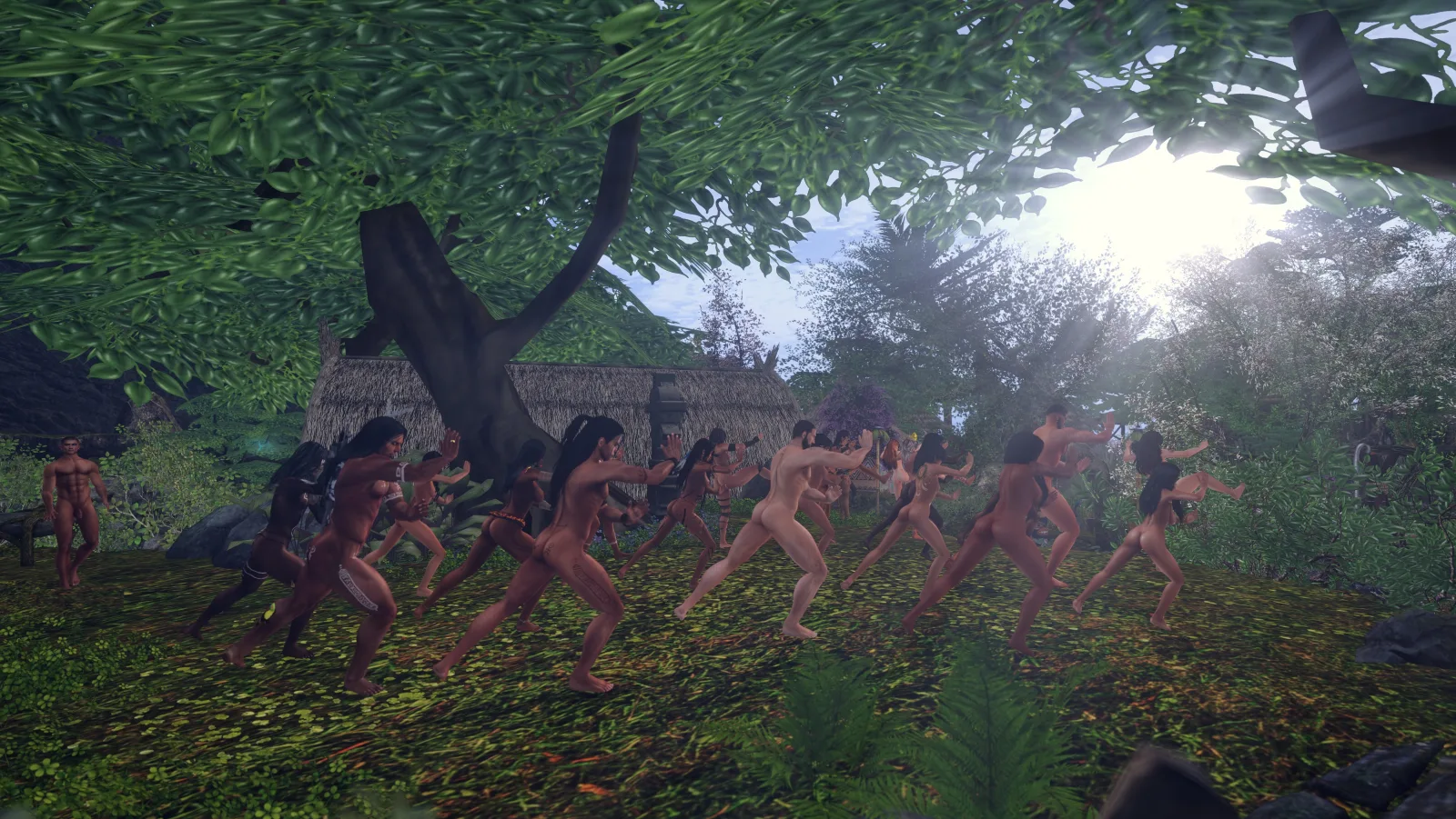 Unclothed dancers perform a ritual at the jungle camp under a large tree