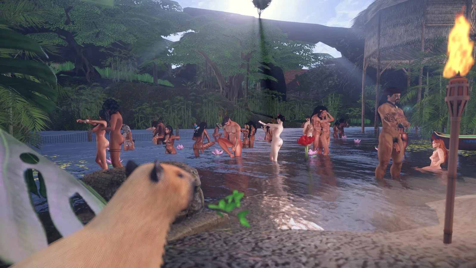 Unclothed villagers bathe and socialize in the shallow river at the jungle camp